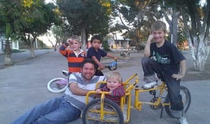 Fr. Rogelio playing with the kids