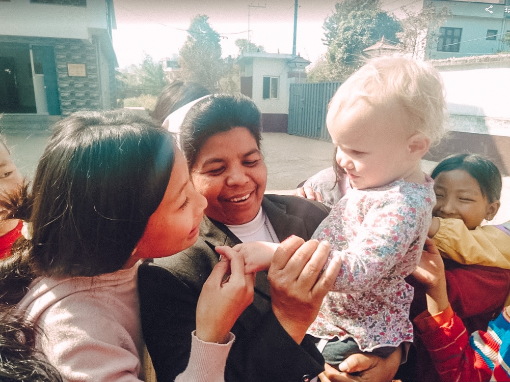 My Dad coordinated one day with the nuns to visit their Girls Home. We were greeted by about a hundred of them, in the driveway of the home, all of them waving and trying to get a look at us, a family of nine white foreigners.