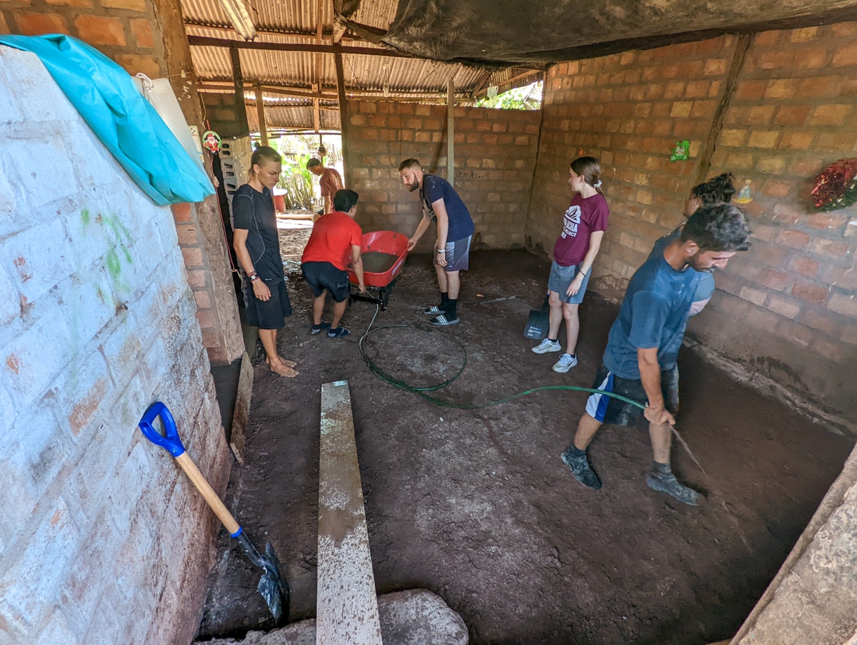 preparing to lay the cement floor in Peru