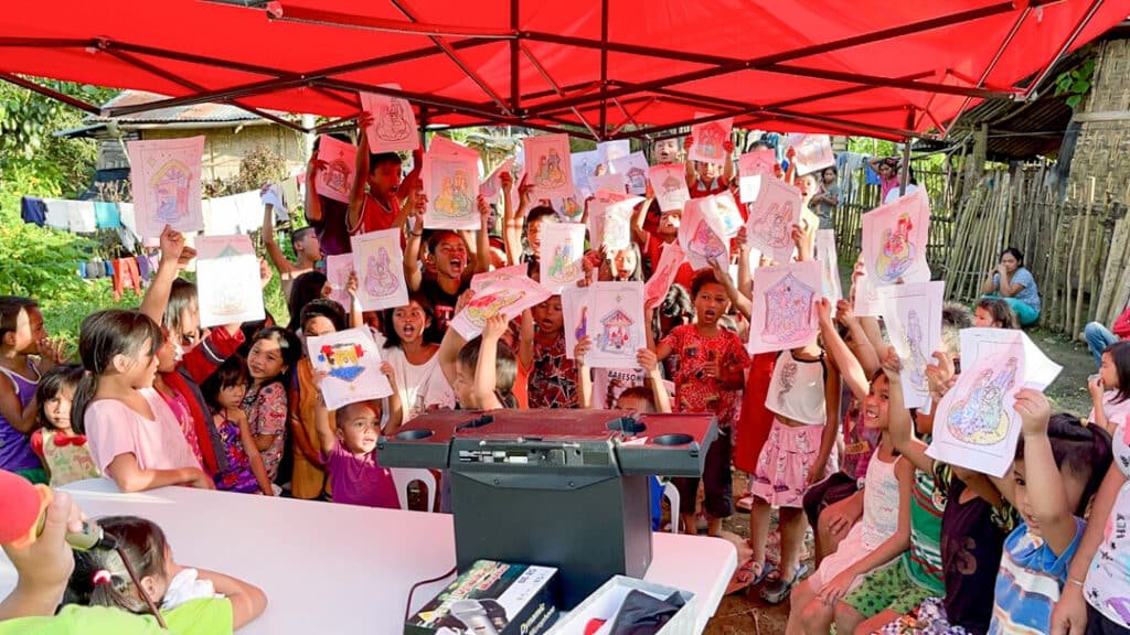 kids in the philippines with coloring sheets